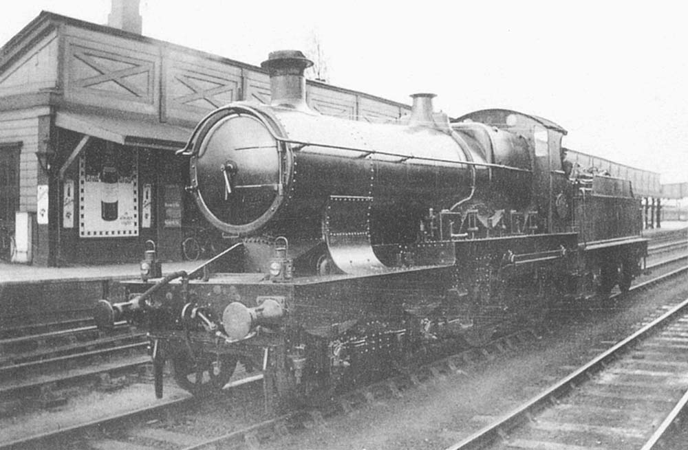 GWR 4-4-0 Atbara class No 4130 'Omdurman' stands in the centre road at Leamington waiting to take the next train forward