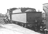 GWR 4-4-0 Duke class No 3276 'St Agnes' pauses between duties although its headlamp codes indicate that it will be piloting a down express