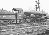 GWR 4073 'Castle' class 2-6-0 No 4090 Dorchester Castle waits at the up platform in 1928 with 11:45am Birkenhead to Paddington