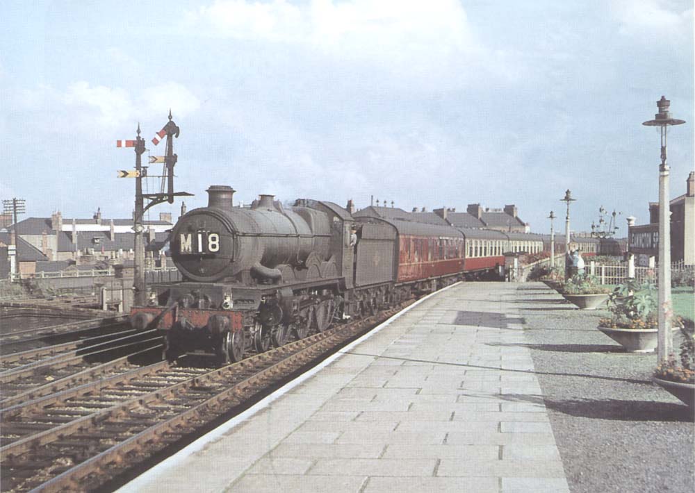 Ex-GWR 4-6-0 Castle class No 7000 'Viscount Portal enters the south end of the station with the 2 10pm Paddington to Birkenhad express