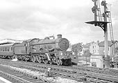 British Railways built 4-6-0 Castle class No 7012 'Barry Castle' sits at the up home signal waiting for the off to Oxford
