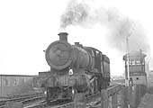 Ex-GWR 68xx Class 4-6-0 No 6879 'Overton Grange' runs light engine towards Leamington shed on 13th March 1965