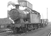 Ex-GWR 56xx Class 0-6-2T No 6644 is seen blowing off steam by Leamington coaling stage on 13th March 1965