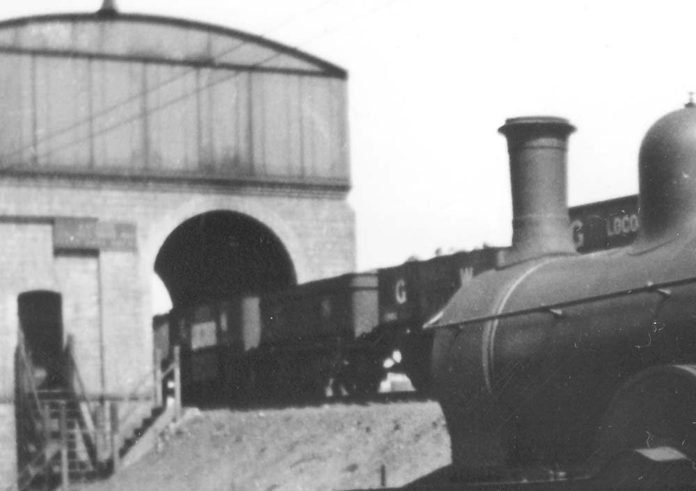 Close up showing the the timber steps used by staff to reach the coaling platform from rail level