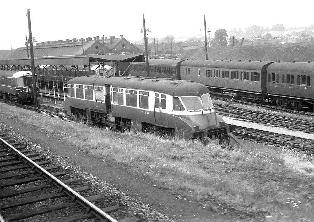 Ex-Great Western Railcar No 14 is seen standing on the diesel refueling line stopped hard up to the buffers