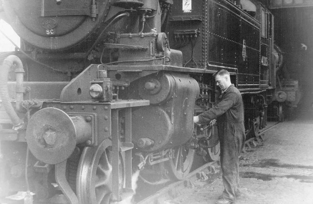 Fitter John Thomas Kendrick is seen working on British Railways built Class 2MT 2-6-2T No 41285 at Leamington Shed