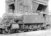 Ex-GWR 2-6-2T Prairie No 4112 stands under the coaling stage with its enlarged coal tipping mechanism