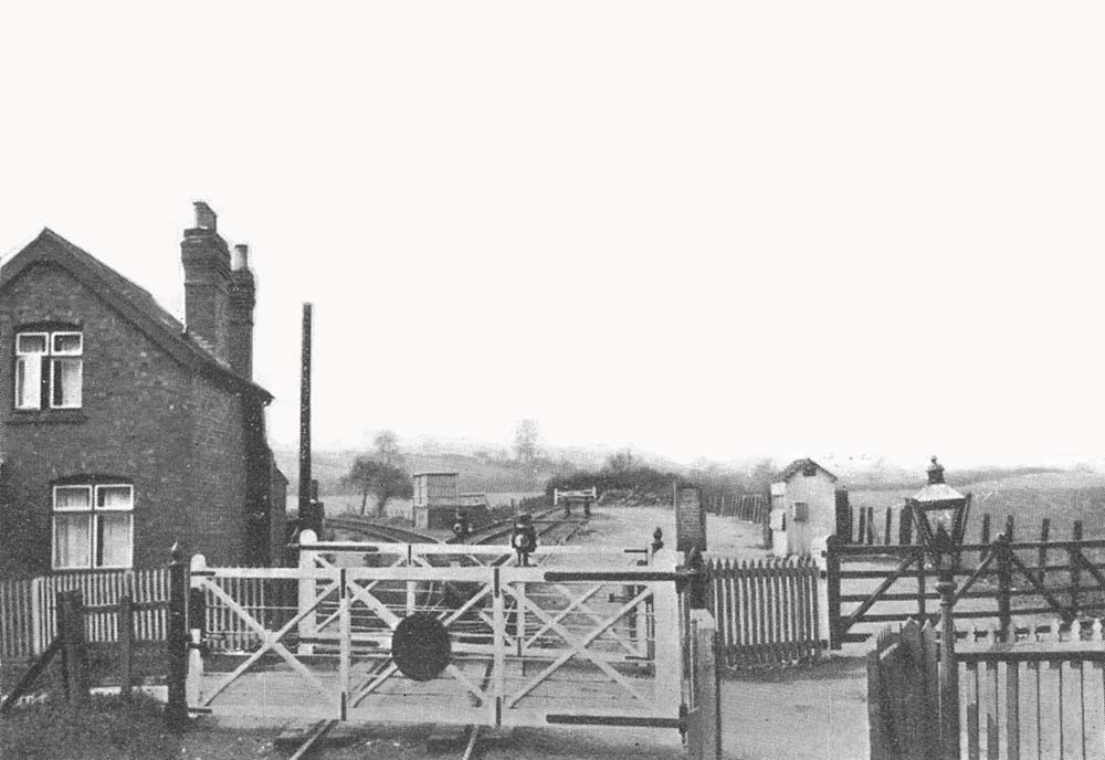 Looking past the gates towards the basic goods yard with the line to Moreton-in-Marsh curving away to the left