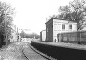 View of the station after closure with the platform buildings still in place but with the original sparse platform fittings now removed