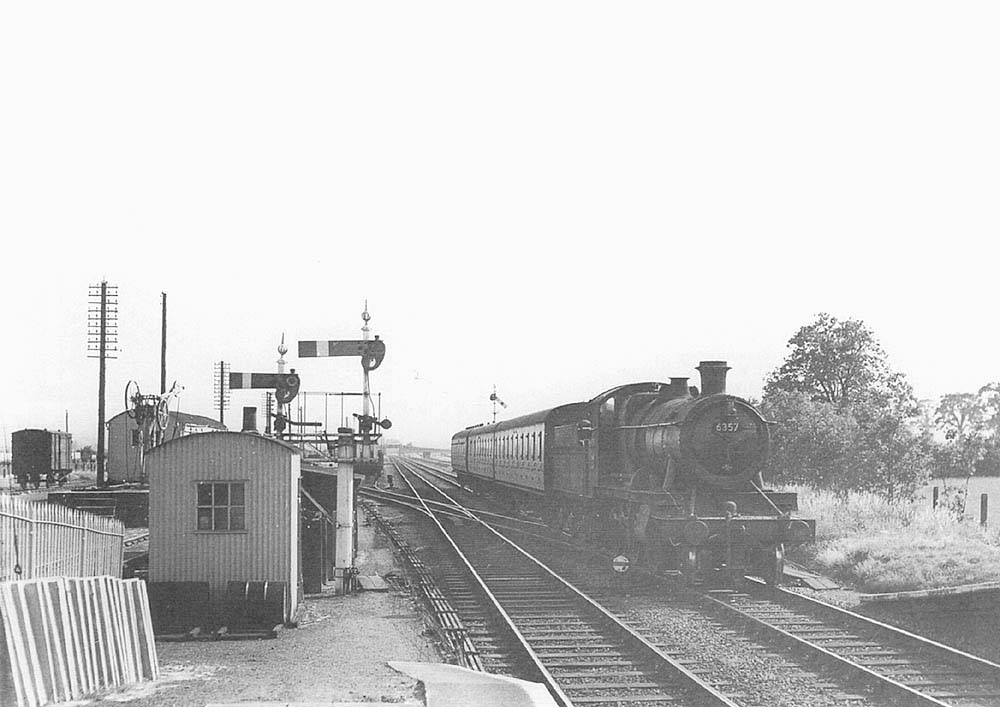 Ex-GWR 4-6-0 43xx Class No 6357 arrives at Long Marston with a stopping train to Stratford upon Avon and onwards to Birmingham on 15th June 1957