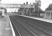 A later view of Long Marston station looking towards Stratford upon Avon now with a passenger footbridge and cycle shed
