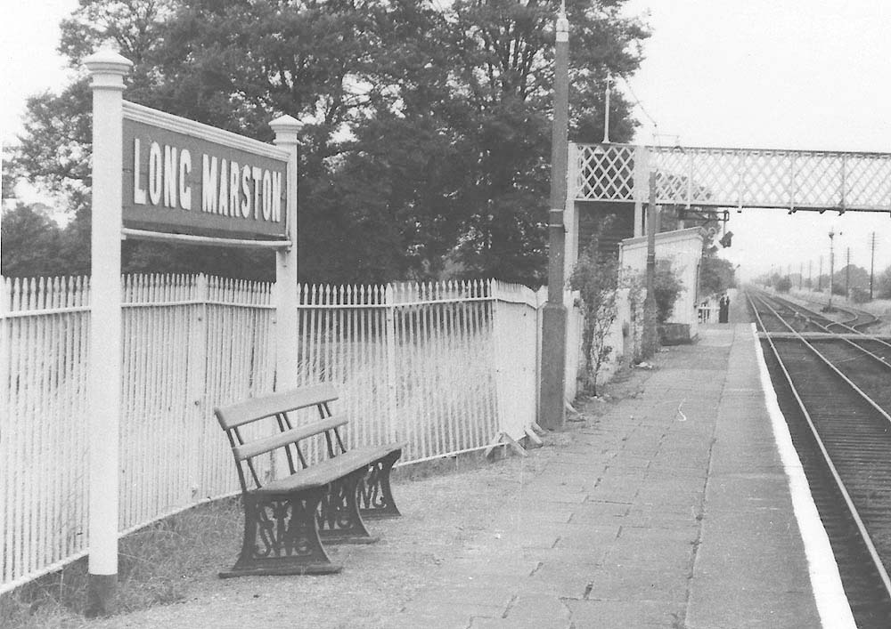 Close up showing the portion of platform widened to accommodate passenger seating and the paving which replaced the original brick surface