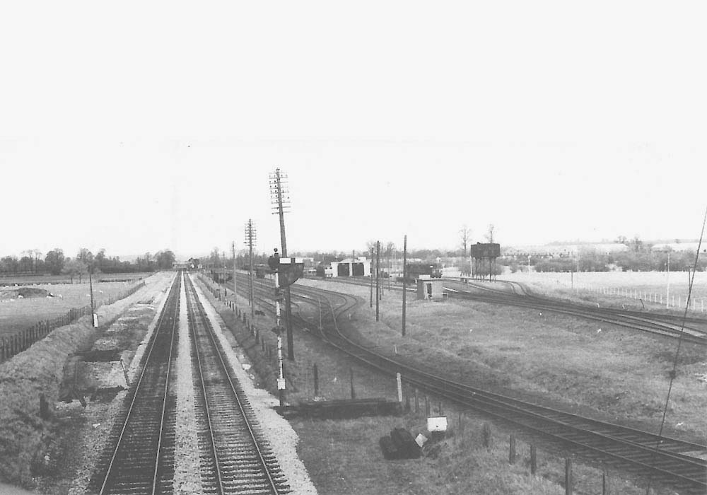 Looking towards Stratford upon Avon with Long Marston station in the distance and the lifted loop line on the right