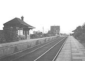 Looking south in 1924 along the up platform towards Honeybourne showing the down platform building in pristine condition