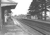 Looking south along the down platform towards Honeybourne and Milcote Signal Box and level crossing with up waiting room on the right