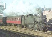 A grimy GWR designed 2-6-2T large prairie No 4161 of the 51XX class on a three coach suburban passenger train