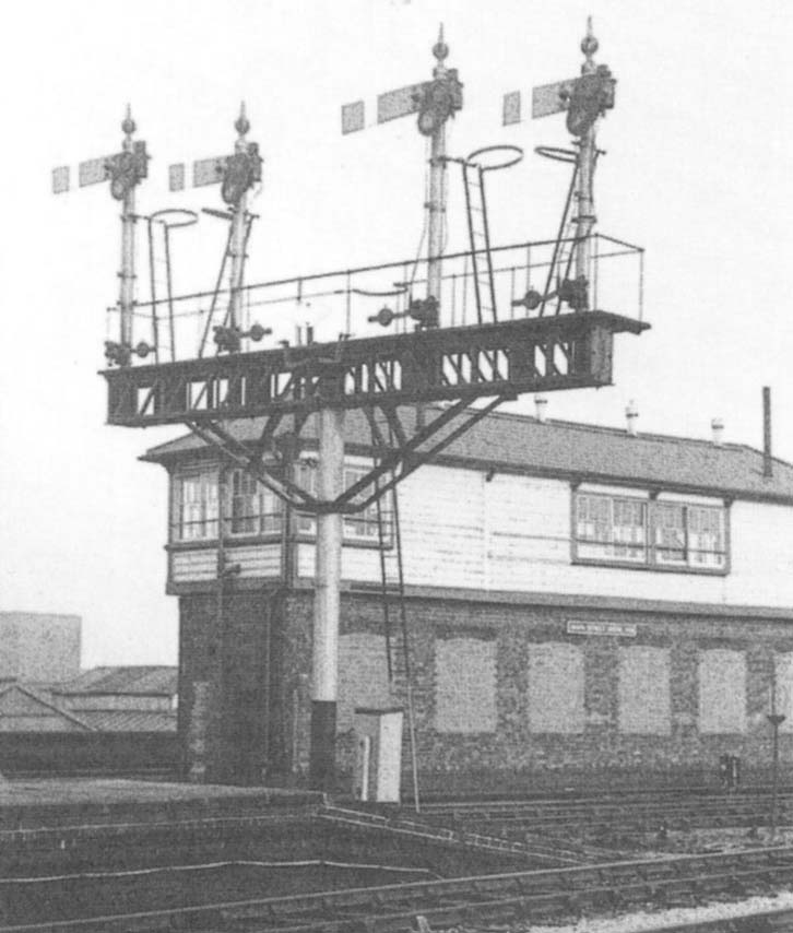 Close to the rear of Moor Street signal box at the end of the island platform, British Railways installed a replacement steel tubular signal post