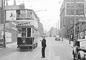 View along Moor Street as one of Birmingham's Trams passes the front of Moor Street station prior to their withdrawal