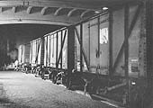 Moor Street's low level shed B where a line of covered wagons are seen waiting to be unloaded