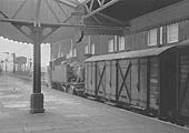 Ex-Great Western Railway 2-6-2T with a parcels train of long wheelbase covered wagons in platform 3