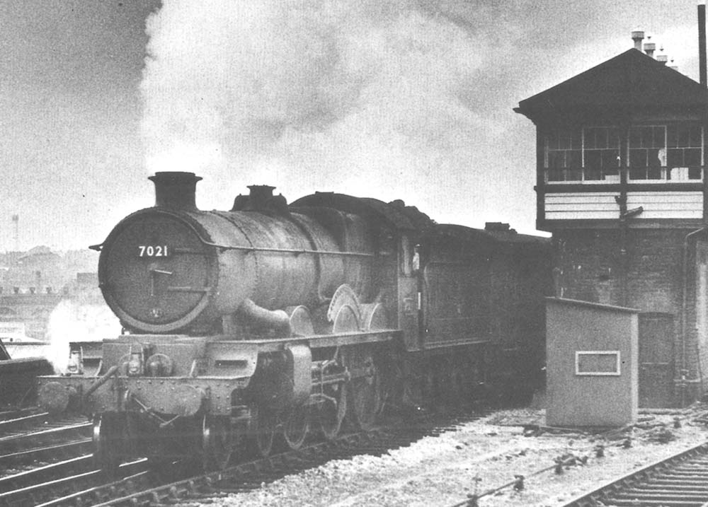 British Railways 4-6-0 class No 7021 �Haverfordwest Castle� crosses from the down relief to the down main line