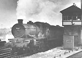 British Railways 4-6-0 class No 7021 �Haverfordwest Castle� crosses from the down relief to the down main line