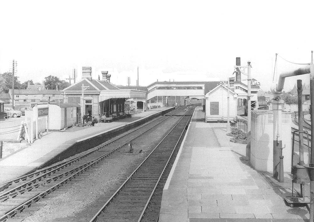 Looking north along the up platform towards Worcester with the tramway offices and workshops to the left