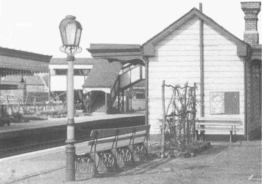 This close up shows some of the different  features seen on the up platform including the sculptured fascia board and arched topped gas lamppost
