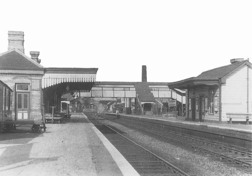 Looking from the down platform towards Worcester with the main station building on the left and the passenger footbridge in the distance