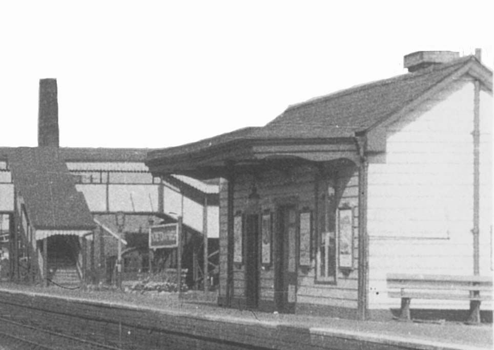Close up showing the up platform 'Brunel' type waiting room on the station's island platform