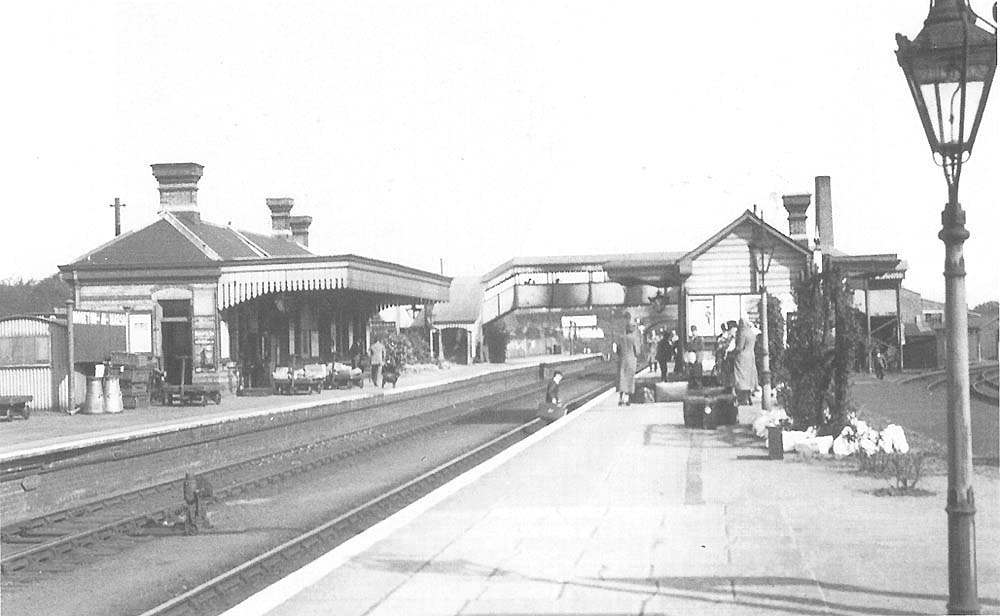 A 1930s view looking across from the up platform to the station's main brick built building on the down platform