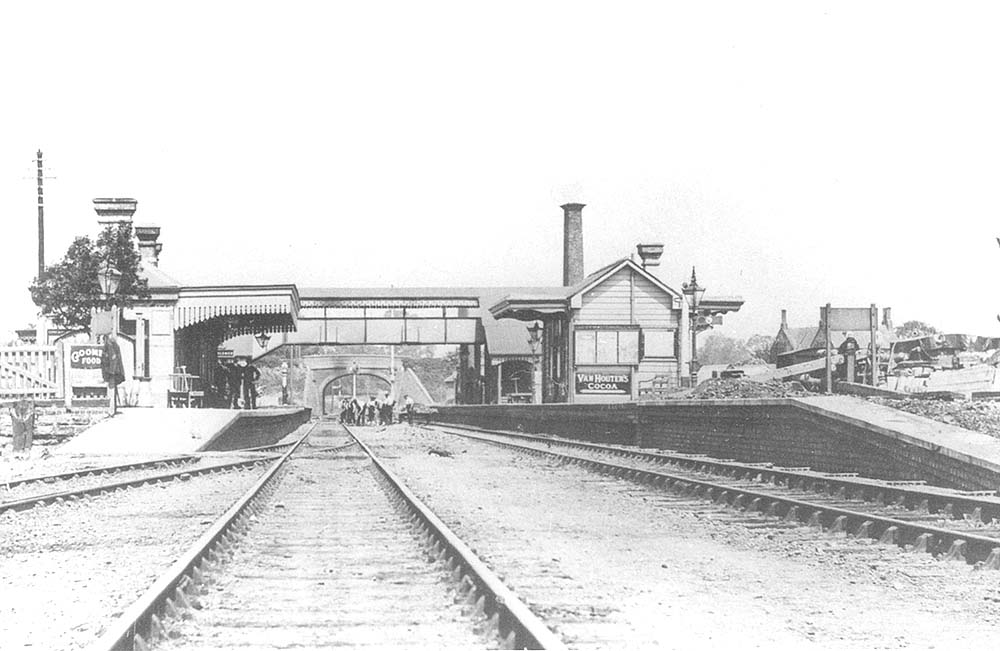 View of the station towards the end of the construction of new buildings in 1872-3 with a PW gang putting the finishing touches to the trackwork