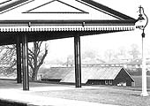 Close up showing the wooden single storey Pavilion on the Sports Ground at the bottom of the embankment