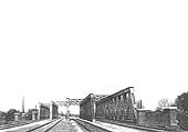An official photograph of the four road braced framework girder bridge built to carry the GWR's new widened lines over the main Birmingham Road