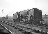 BR Standard Class 9F 2-10-0 No 92204 reverses into Queens Head sidings on 28th May 1964