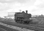 Ex-GWR 57xx Class 0-6-0PT No 8739 runs light ending past Queens Head signal box on 26th September 1964