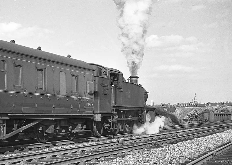 British Railways built 5101 Class 2-6-2T No 4171 heads an an up empty stock working to Snow Hill on 29th June 1964
