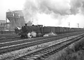 Ex-GWR 68xx Class 4-6-0 No 6815 'Frilford Grange' passes through Queens Head sidings with a down freight on 1st May 1965