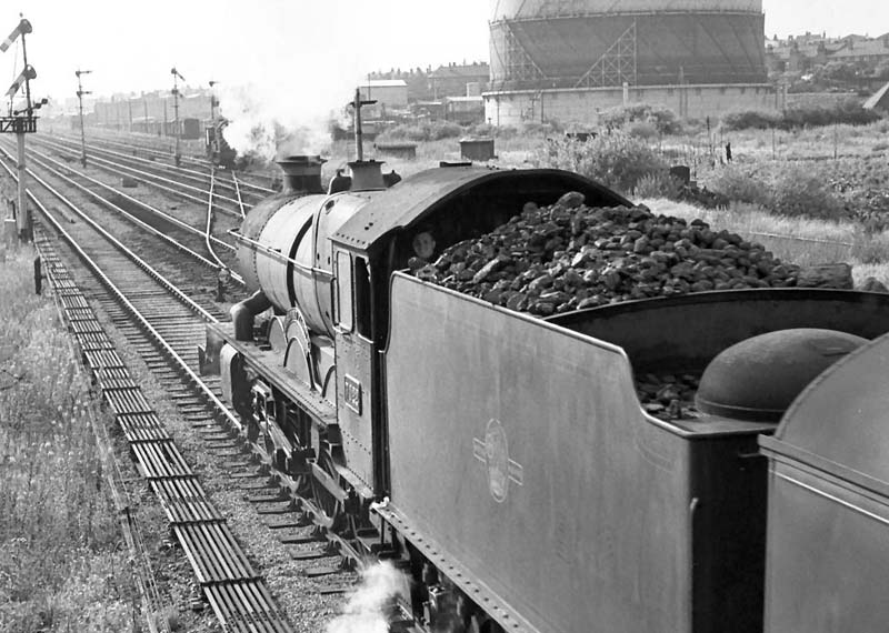 British Railways 4073 class 4-6-0 No 7022 'Hereford Castle' was photographed on the Down relief line from Queen's Head Signal Box on 22nd July 1964