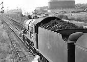 BR 4-6-0 No 7022 'Hereford Castle' on the Down relief line by Queen's Head Signal Box on 22nd July 1964