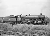 British Railways built 6959 Class 4-6-0 No 7915 'Mere Hall' is seen reversing into Queens Head sidings on 16th July 1964