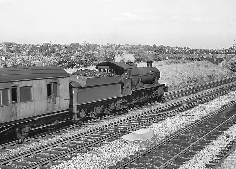 British Railways built 78xx Class 4-6-0 No 7824 'Iford Manor' passes Queens Road sidings on 29th June 1964