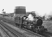 Ex-GWR Castle Class 4-6-0 No 5091 'Cleeve Abbey' is seen reversing into Queens Head sidings ready to collect coaching stock on 29th June 1964 