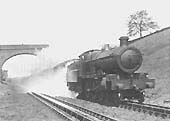 GWR 4-6-0 29xx 'Saint' class No 2902 'Lady of the Lake' with an A headcode on an up express picking up water from Rowington troughs in the 1920s