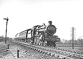 GWR 4-6-0 Saint class No 2928 'Saint Sebastian' is seen at the head of an up express having just taken on water at Rowington troughs