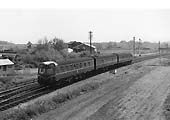 A three-car Swindon built Cross Country DMU passes the junction with the SMJ on the 13:25pm Worcester Shrub Hill to Leamington Spa service on 25th May 1963