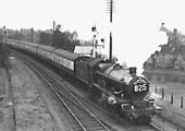 An unidentified ex-GWR 4-6-0 Castle Class locomotive is seen approaching Sanctus Street bridge with the southbound Cornishman in 1958