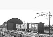 View of the goods shed and extra storage facilities provided by the addition of two grounded bodies which have been raised clear of the ground