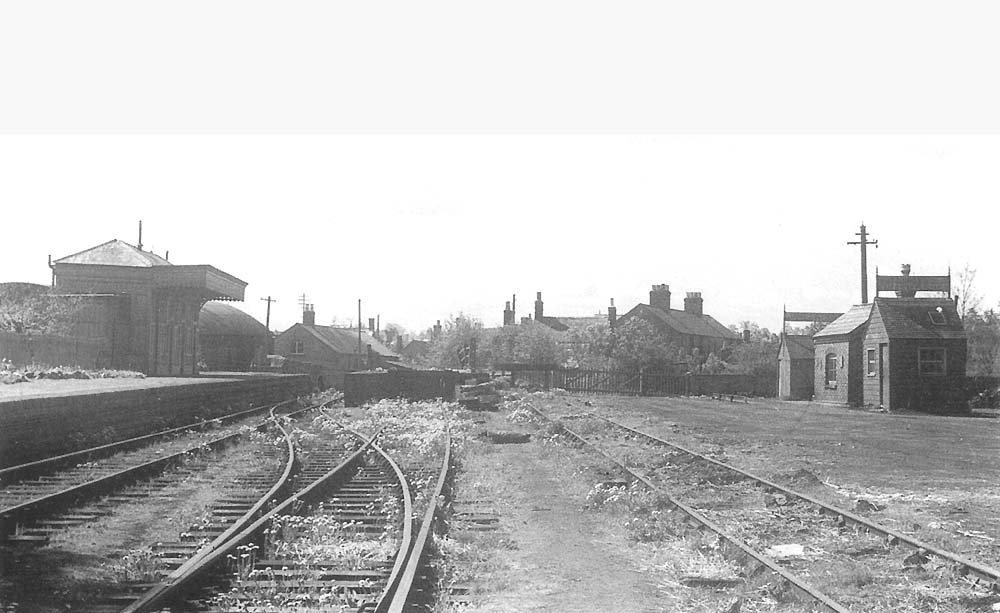 A panoramic view of the terminus facing the buffers with Hudson's sack office, the weigh bridge office and Hutchings coal office on the right