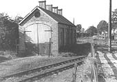 View of the engine shed after it was closed and during the time it was used to garage the GWR road lorry used to distribute goods from the station